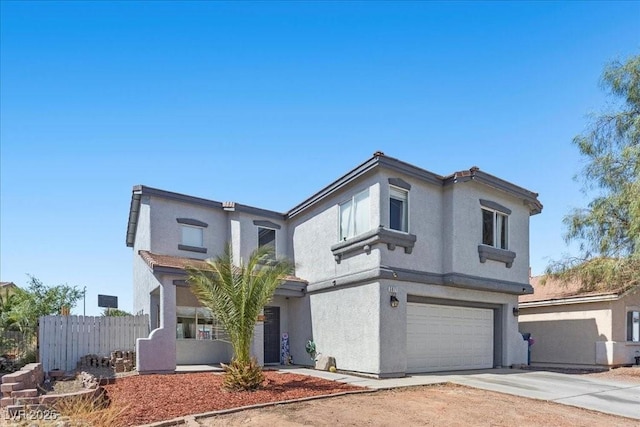 3871 Trellis View Ave, Las Vegas, NV 89115 - view of front facade featuring an attached garage, driveway, and stucco siding