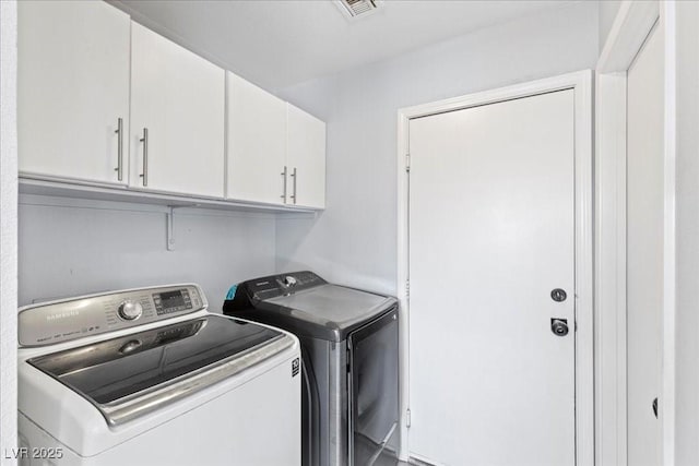 3871 Trellis View Ave, Las Vegas, NV 89115 - laundry area featuring washer and clothes dryer and cabinet space
