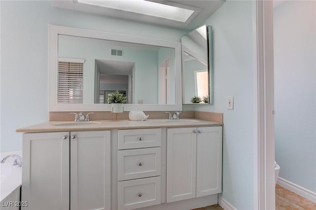 4742 Obannon Dr Unit A, Las Vegas, NV 89102 - full bathroom featuring double vanity and a bathtub