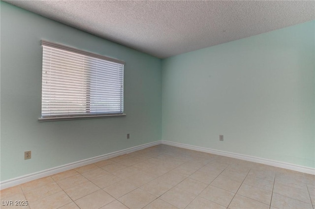 4742 Obannon Dr Unit A, Las Vegas, NV 89102 - spare room with a textured ceiling and baseboards