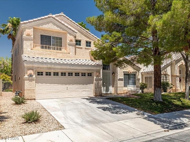 7924 Mcdowell Dr, Las Vegas, NV 89129 - view of front facade featuring a tile roof, driveway, an attached garage, stone siding, and stucco siding