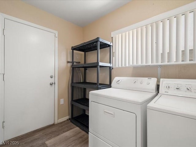 7924 Mcdowell Dr, Las Vegas, NV 89129 - laundry area with washer and clothes dryer and wood finished floors