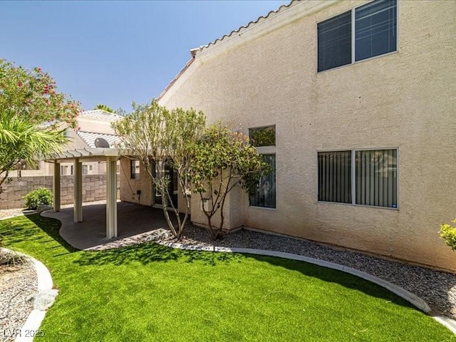 7924 Mcdowell Dr, Las Vegas, NV 89129 - back of property featuring a patio area, stucco siding, and a pergola