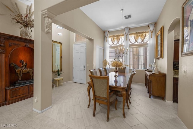 1329 Calle Cantar, Henderson, NV 89012 - dining room featuring a chandelier and baseboards