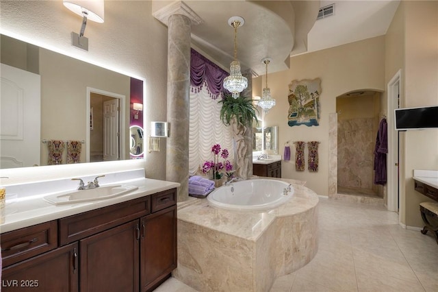 1329 Calle Cantar, Henderson, NV 89012 - bathroom with vanity, a bath, tile patterned floors, and a walk in shower