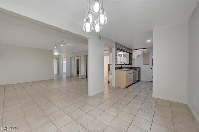 483 Marina Cv, Boulder City, NV 89005 - unfurnished living room featuring light tile patterned floors and a chandelier
