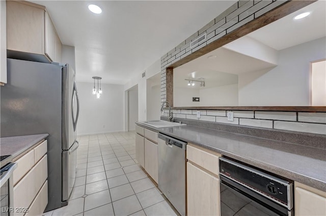 483 Marina Cv, Boulder City, NV 89005 - kitchen with appliances with stainless steel finishes, light tile patterned flooring, recessed lighting, and dark countertops