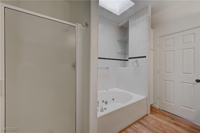 483 Marina Cv, Boulder City, NV 89005 - bathroom featuring a skylight and wood finished floors