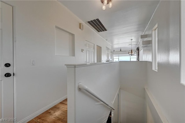 483 Marina Cv, Boulder City, NV 89005 - corridor with an upstairs landing and wood finished floors