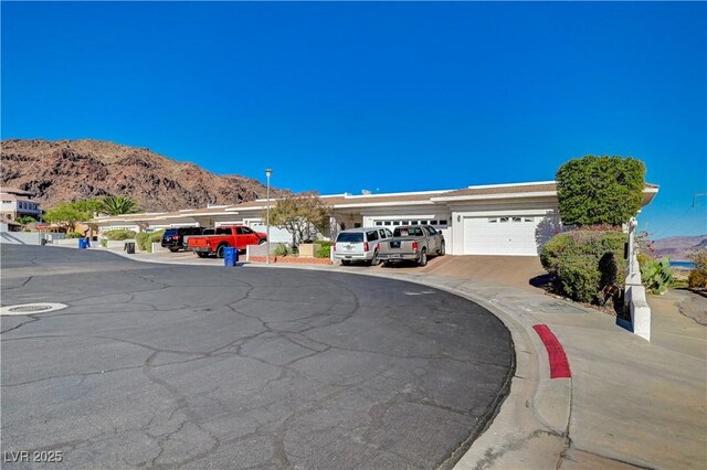 483 Marina Cv, Boulder City, NV 89005 - view of front of house featuring a mountain view and driveway