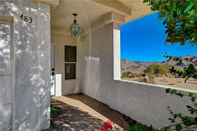 483 Marina Cv, Boulder City, NV 89005 - entrance to property featuring a mountain view and stucco siding