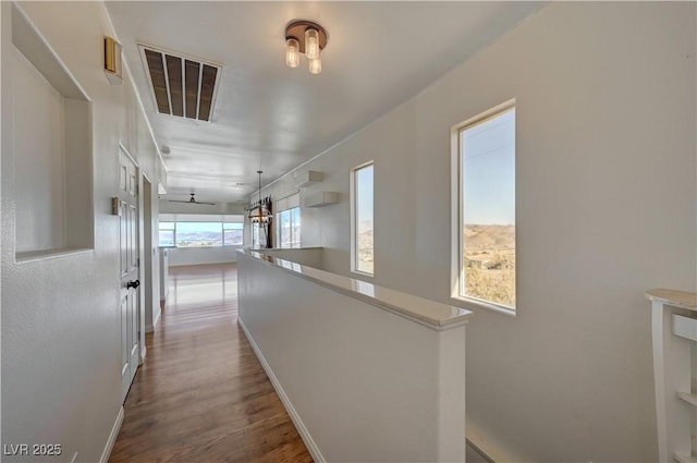 483 Marina Cv, Boulder City, NV 89005 - hall with wood finished floors and an upstairs landing