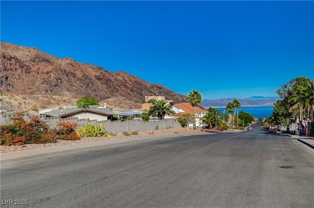 483 Marina Cv, Boulder City, NV 89005 - view of asphalt street with a mountain view and sidewalks