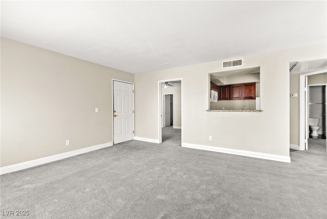 6800 E Lake Mead Blvd Unit 1018, Las Vegas, NV 89156 - carpeted spare room featuring baseboards