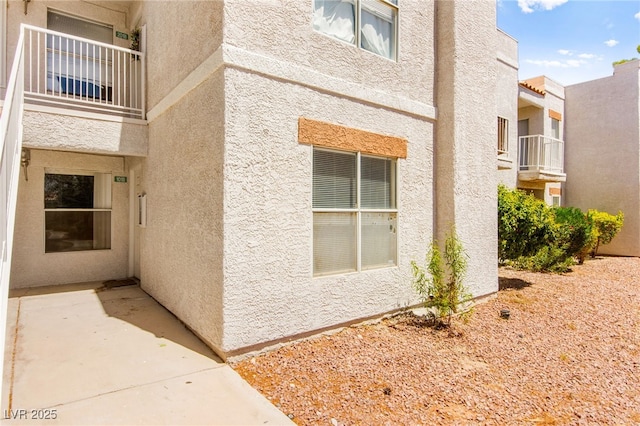 6800 E Lake Mead Blvd Unit 1018, Las Vegas, NV 89156 - view of home's exterior featuring stucco siding