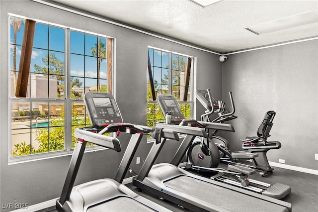 6800 E Lake Mead Blvd Unit 1018, Las Vegas, NV 89156 - exercise room with a textured wall and a textured ceiling