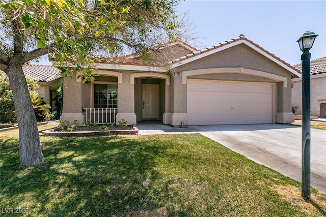 4825 White Aspen Ave, Las Vegas, NV 89130 - view of front of house with stucco siding, a tile roof, and concrete driveway