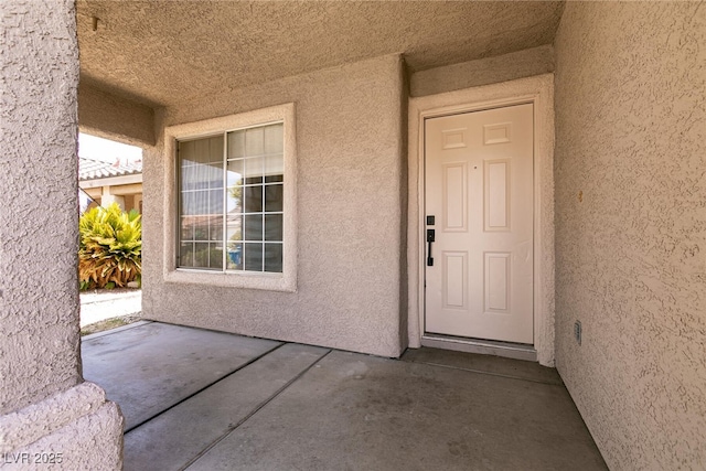 4825 White Aspen Ave, Las Vegas, NV 89130 - entrance to property featuring stucco siding