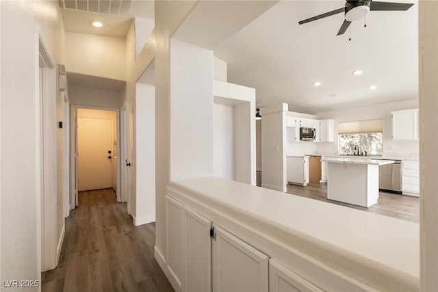 4825 White Aspen Ave, Las Vegas, NV 89130 - corridor featuring dark wood-type flooring and recessed lighting