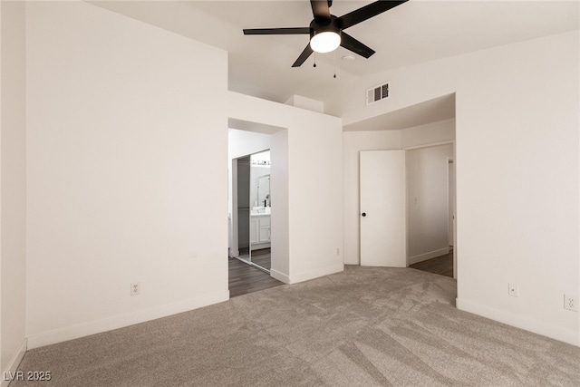4825 White Aspen Ave, Las Vegas, NV 89130 - unfurnished bedroom with carpet, connected bathroom, high vaulted ceiling, and ceiling fan