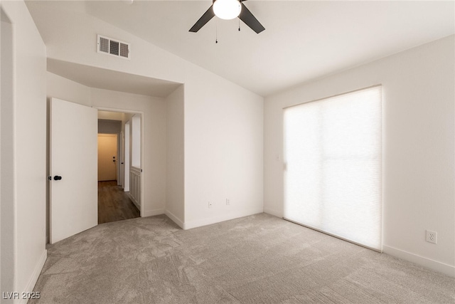 4825 White Aspen Ave, Las Vegas, NV 89130 - carpeted spare room featuring vaulted ceiling and a ceiling fan