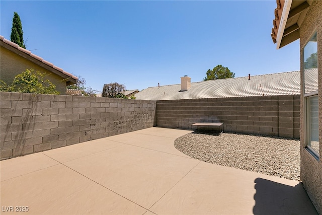 4825 White Aspen Ave, Las Vegas, NV 89130 - fenced backyard with a patio area