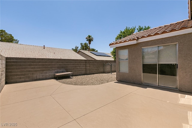4825 White Aspen Ave, Las Vegas, NV 89130 - fenced backyard with a patio area