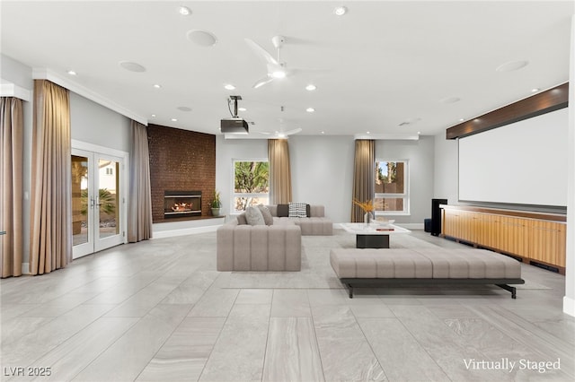 5680 N Fort Apache Rd, Las Vegas, NV 89149 - home theater featuring a large fireplace, recessed lighting, french doors, and a ceiling fan