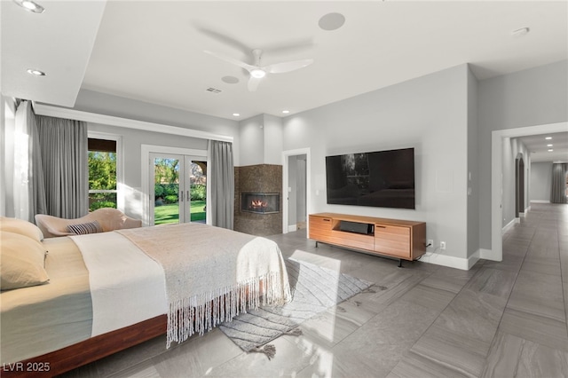 5680 N Fort Apache Rd, Las Vegas, NV 89149 - bedroom featuring access to outside, a fireplace, recessed lighting, a ceiling fan, and french doors