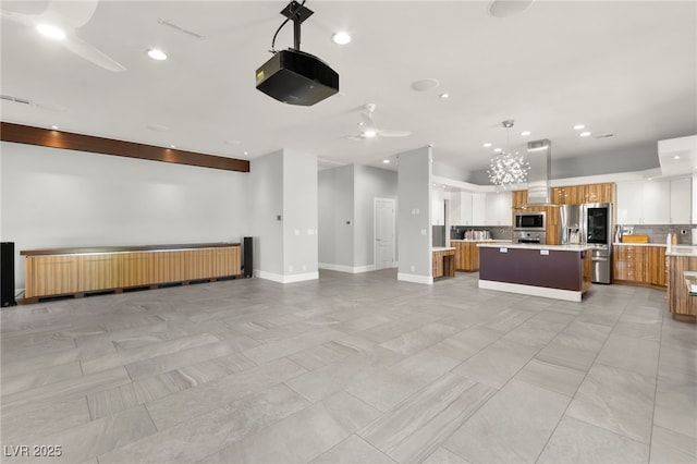 5680 N Fort Apache Rd, Las Vegas, NV 89149 - kitchen with open floor plan, light countertops, exhaust hood, a center island, and recessed lighting