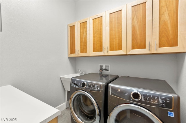 5680 N Fort Apache Rd, Las Vegas, NV 89149 - laundry room with cabinet space and washer and dryer