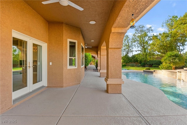5680 N Fort Apache Rd, Las Vegas, NV 89149 - view of patio featuring french doors, ceiling fan, and an outdoor pool