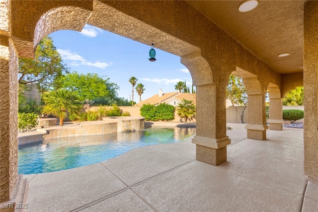 5680 N Fort Apache Rd, Las Vegas, NV 89149 - view of swimming pool with a patio, a fenced backyard, and a pool with connected hot tub
