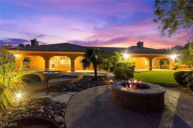 5680 N Fort Apache Rd, Las Vegas, NV 89149 - view of patio featuring an outdoor fire pit