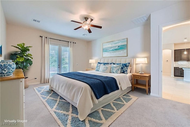 8732 Kendall Brook Cir, Las Vegas, NV 89149 - bedroom with light colored carpet, a ceiling fan, and access to outside
