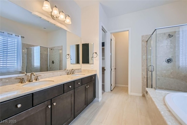 8732 Kendall Brook Cir, Las Vegas, NV 89149 - bathroom with a stall shower, double vanity, a bath, and tile patterned flooring