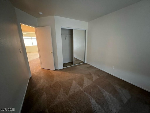 8704 Autumn Wreath Ave, Las Vegas, NV 89129 - unfurnished bedroom featuring carpet floors and a closet