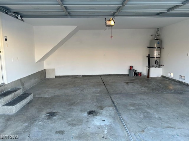 8704 Autumn Wreath Ave, Las Vegas, NV 89129 - garage featuring a garage door opener and strapped water heater