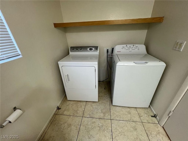8704 Autumn Wreath Ave, Las Vegas, NV 89129 - washroom featuring washer and dryer and light tile patterned floors