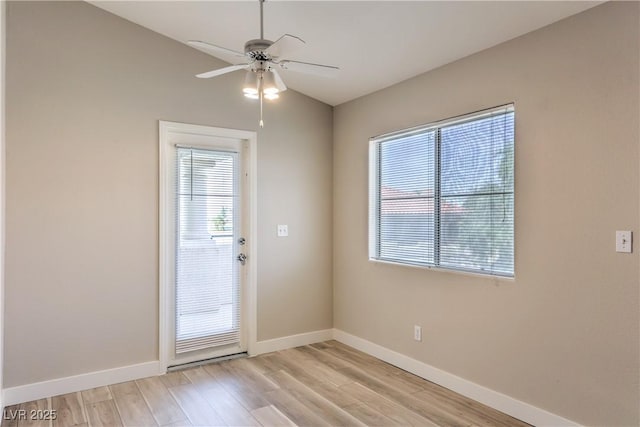 370 Manti Pl Unit 21, Henderson, NV 89014 - doorway to outside with light wood-type flooring, ceiling fan, and lofted ceiling