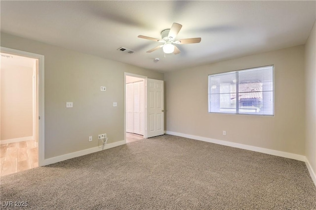 370 Manti Pl Unit 21, Henderson, NV 89014 - unfurnished bedroom featuring light colored carpet and ceiling fan