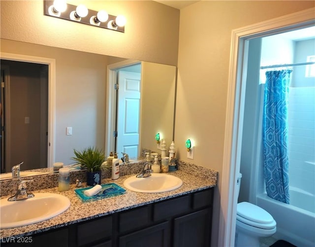 2822 Chetco River St, Laughlin, NV 89029 - bathroom featuring double vanity and shower / bathtub combination with curtain