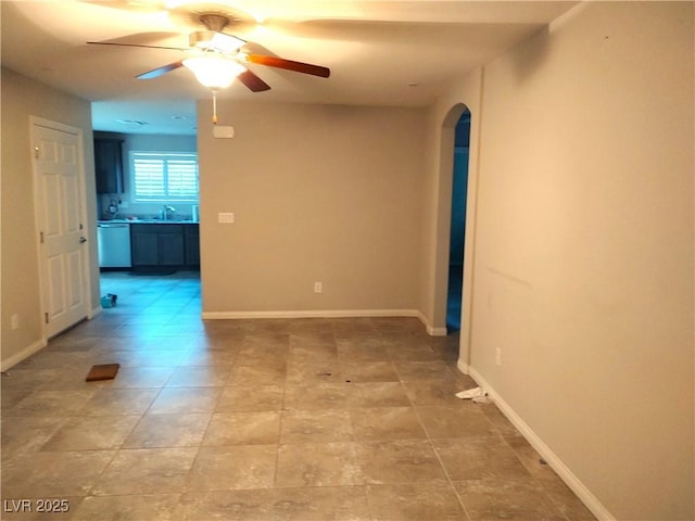 2822 Chetco River St, Laughlin, NV 89029 - unfurnished room with arched walkways and ceiling fan