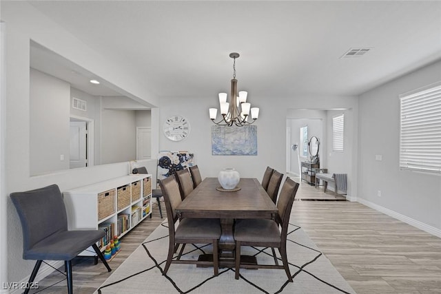 7890 S Miller Ln, Las Vegas, NV 89113 - dining area with a chandelier, light wood-style floors, and recessed lighting