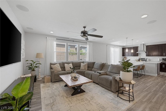 7890 S Miller Ln, Las Vegas, NV 89113 - living area with a ceiling fan, recessed lighting, and light wood-style floors