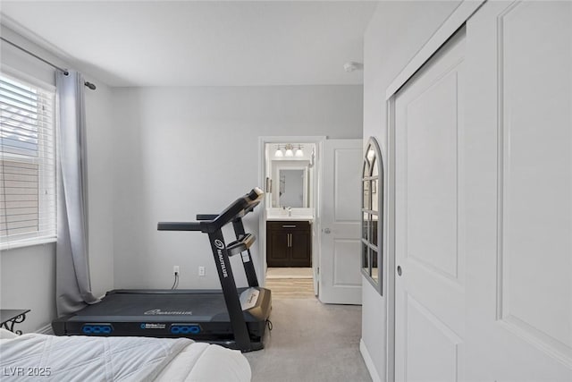 7890 S Miller Ln, Las Vegas, NV 89113 - bedroom featuring light colored carpet, ensuite bathroom, and a closet