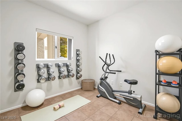 10920 Grand Haven Ave, Las Vegas, NV 89134 - workout room with light tile patterned floors and baseboards