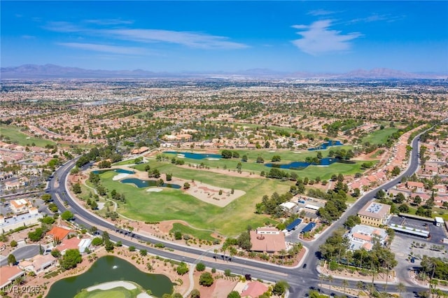 10920 Grand Haven Ave, Las Vegas, NV 89134 - aerial overview of property's location with a water and mountain view, nearby suburban area, and a golf club