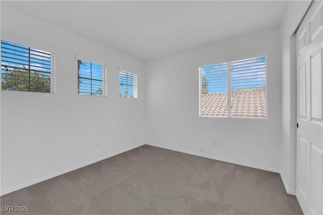21 Rue De Degas, Henderson, NV 89074 - unfurnished bedroom with dark colored carpet and a closet