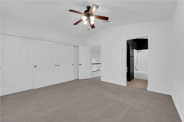 21 Rue De Degas, Henderson, NV 89074 - unfurnished bedroom featuring carpet flooring, vaulted ceiling, a closet, a ceiling fan, and ensuite bathroom